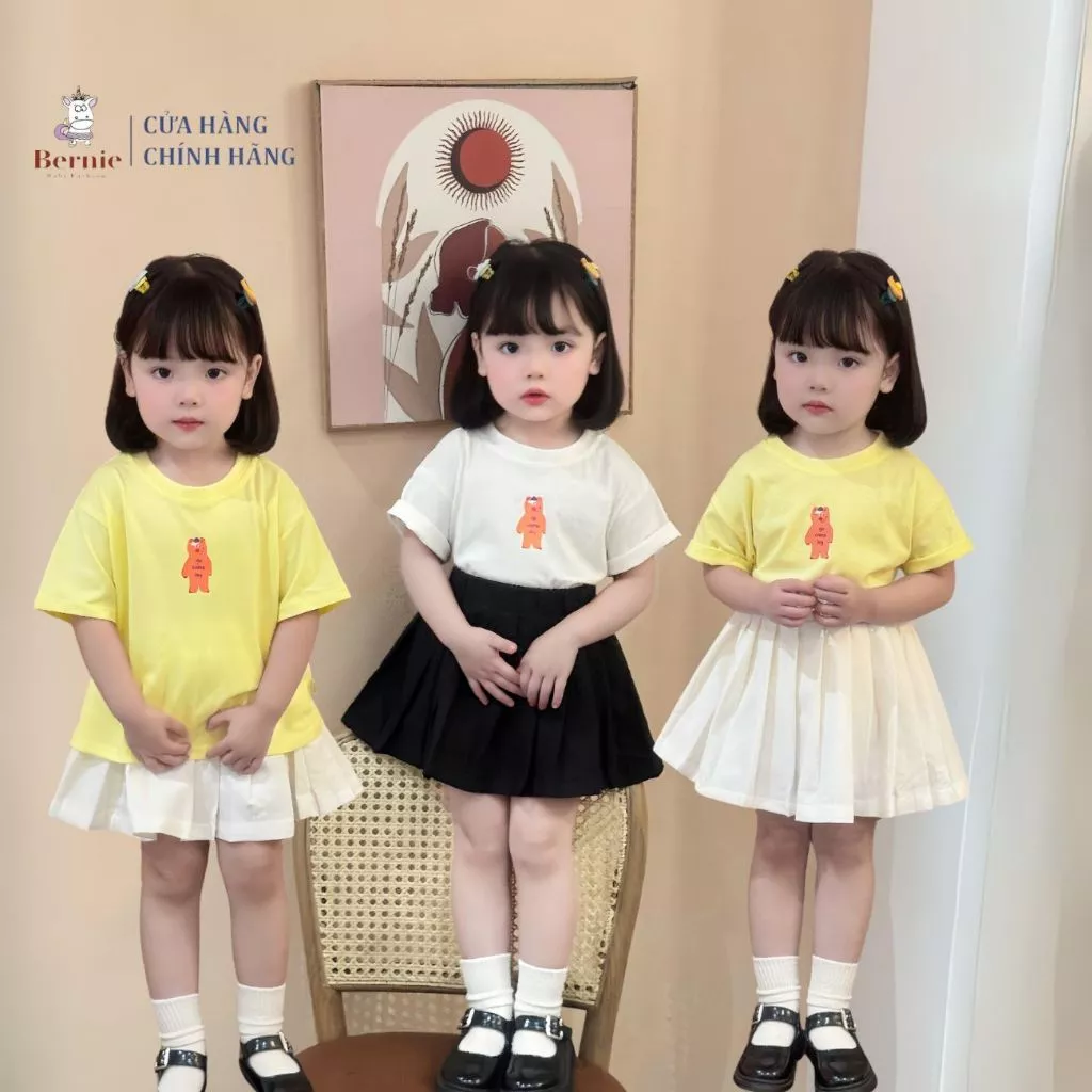 Áo thun in gấu rời chân váy xếp ly tổng hợp bé gái mặc nhà đi học từ 9 đến 25kg Bernie